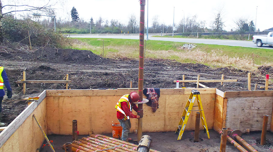 Monopole being installed with helical pile technology