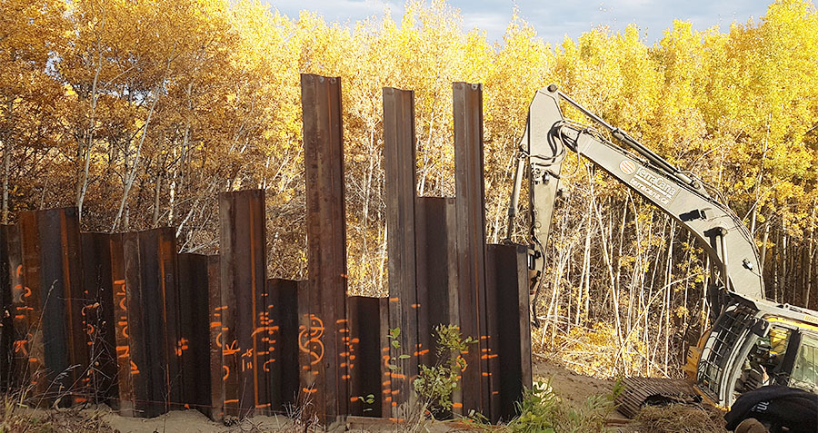 Sheet-pile being driven into place