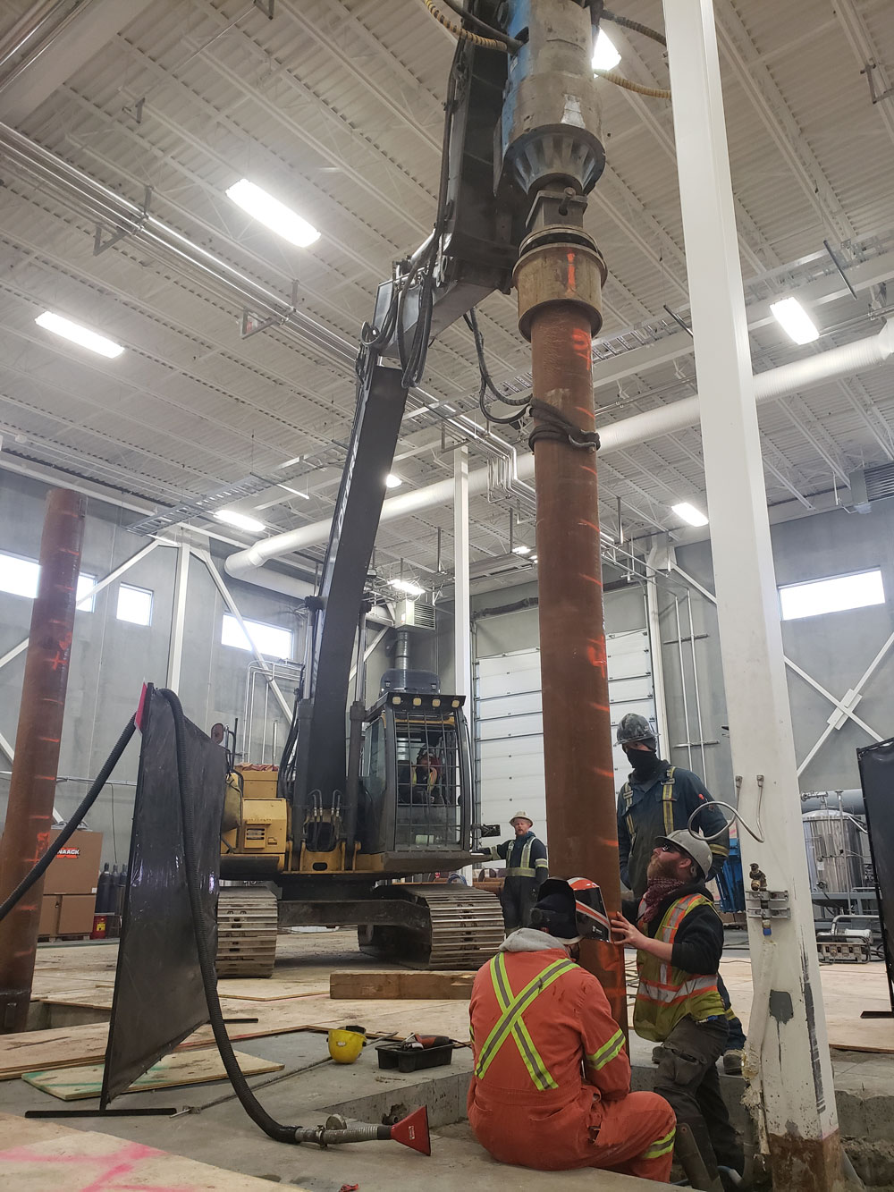 12INCH HELICAL PILING FOUNDATION INSTALL FOR A BREWERY IN SURREY BC