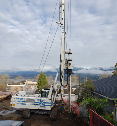 Kelly Augered Pile Beside House Vancouver